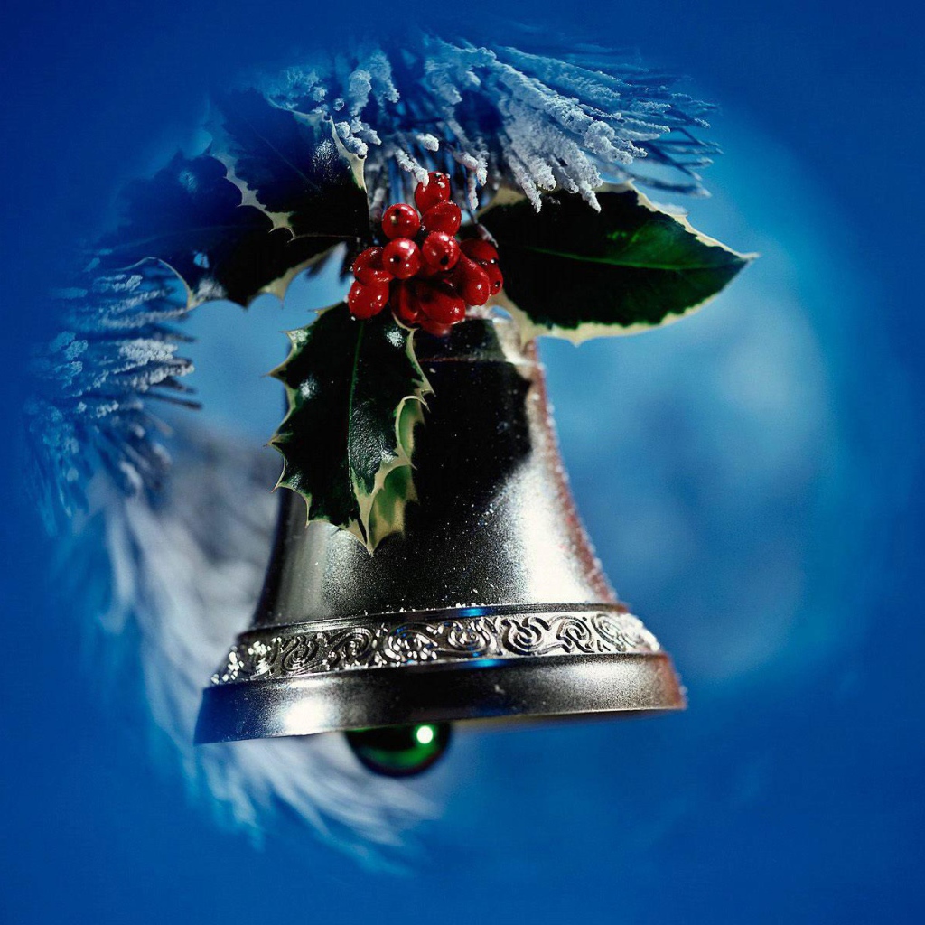 Bell on blue background on Christmas