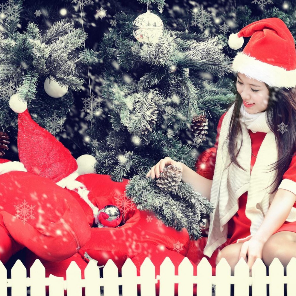 Девочка в костюме Санта клауса