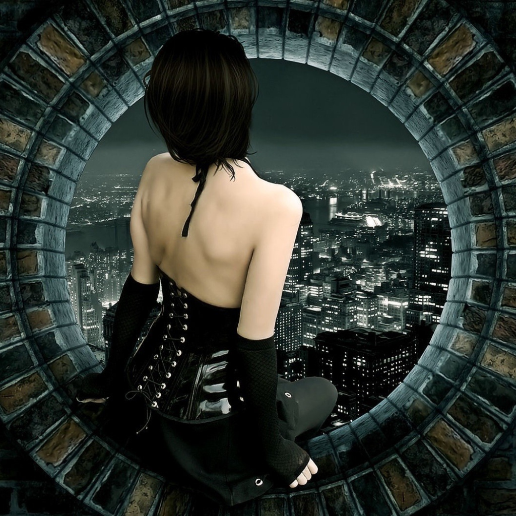 Девушка смотрит на город