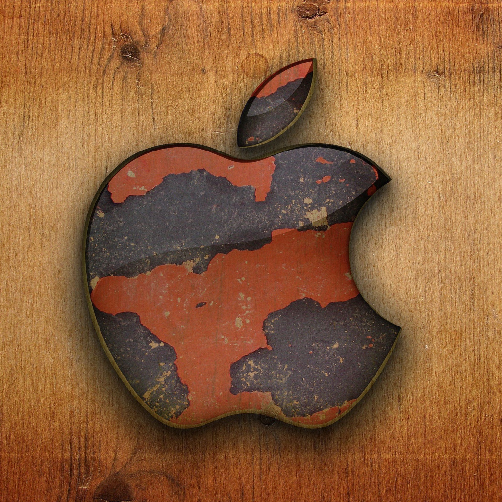 Apple на деревянном фоне