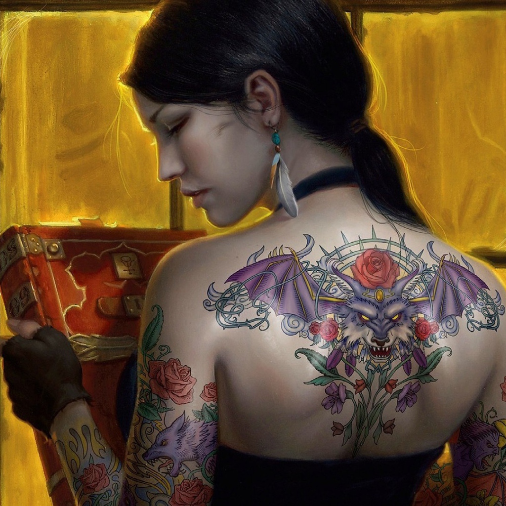 Girl tattoo with a book