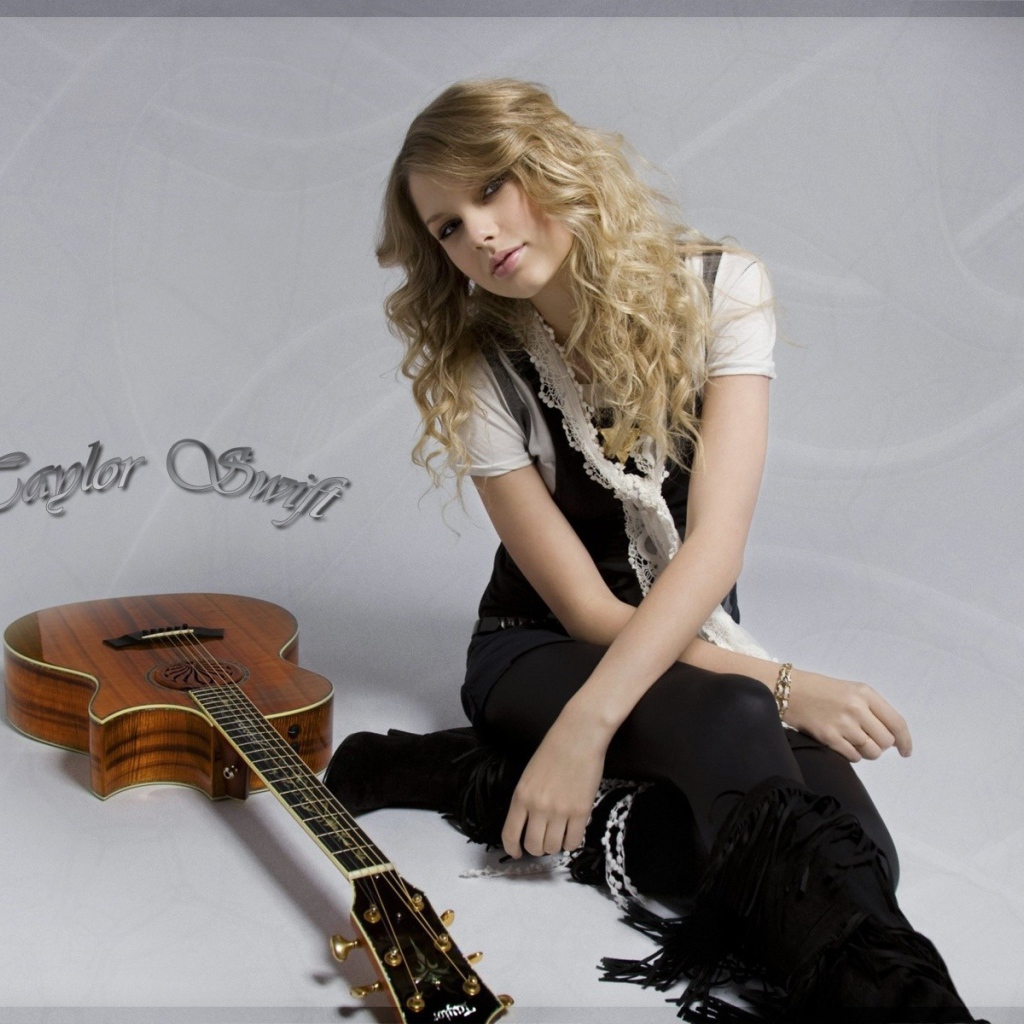 Тейлор с гитарой