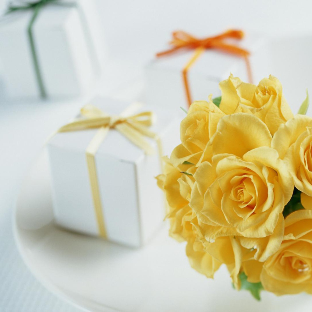Gifts and yellow roses on birthday