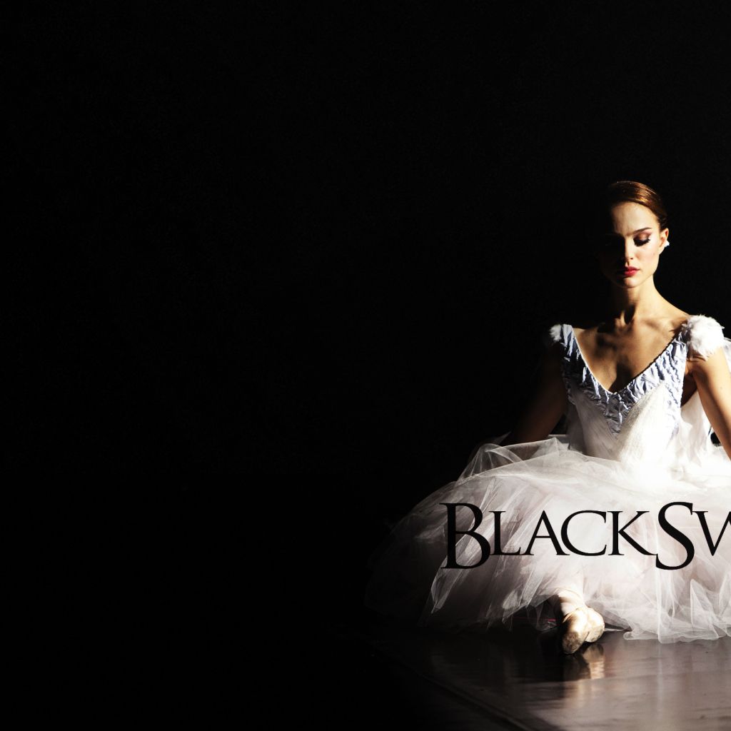 Балерина в образе белого лебедя