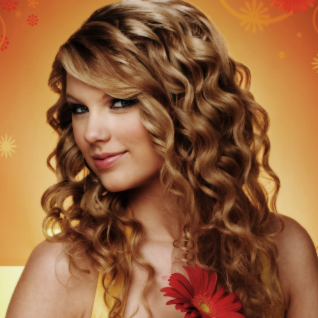 Taylor Swift в оранжевом фоне