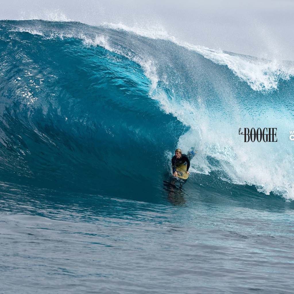 Катание на доске по волне