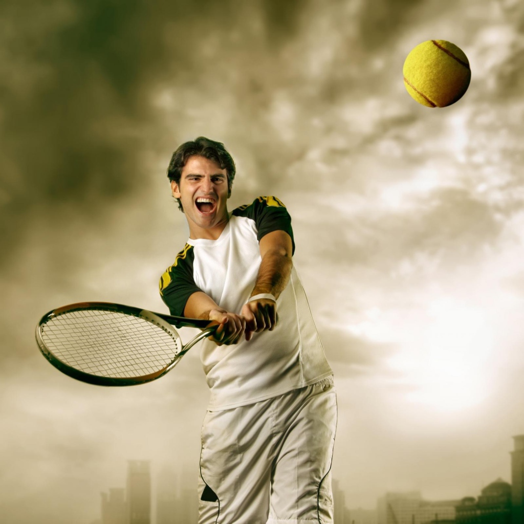 Теннисист отбивает мяч
