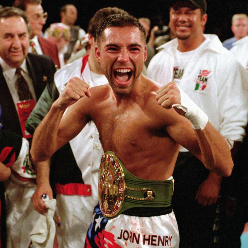 Боксер Оскар Дела Хойя и его пояс