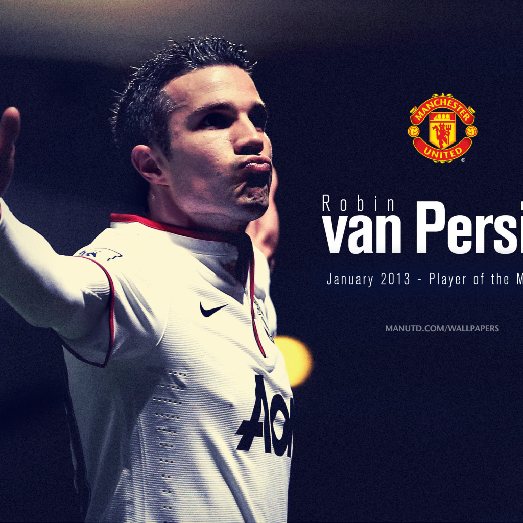 The football player of Manchester United Robin van Persie on dark background