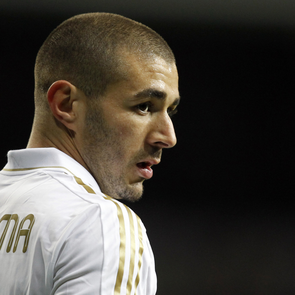The player of Real Madrid Karim Benzema on the black background