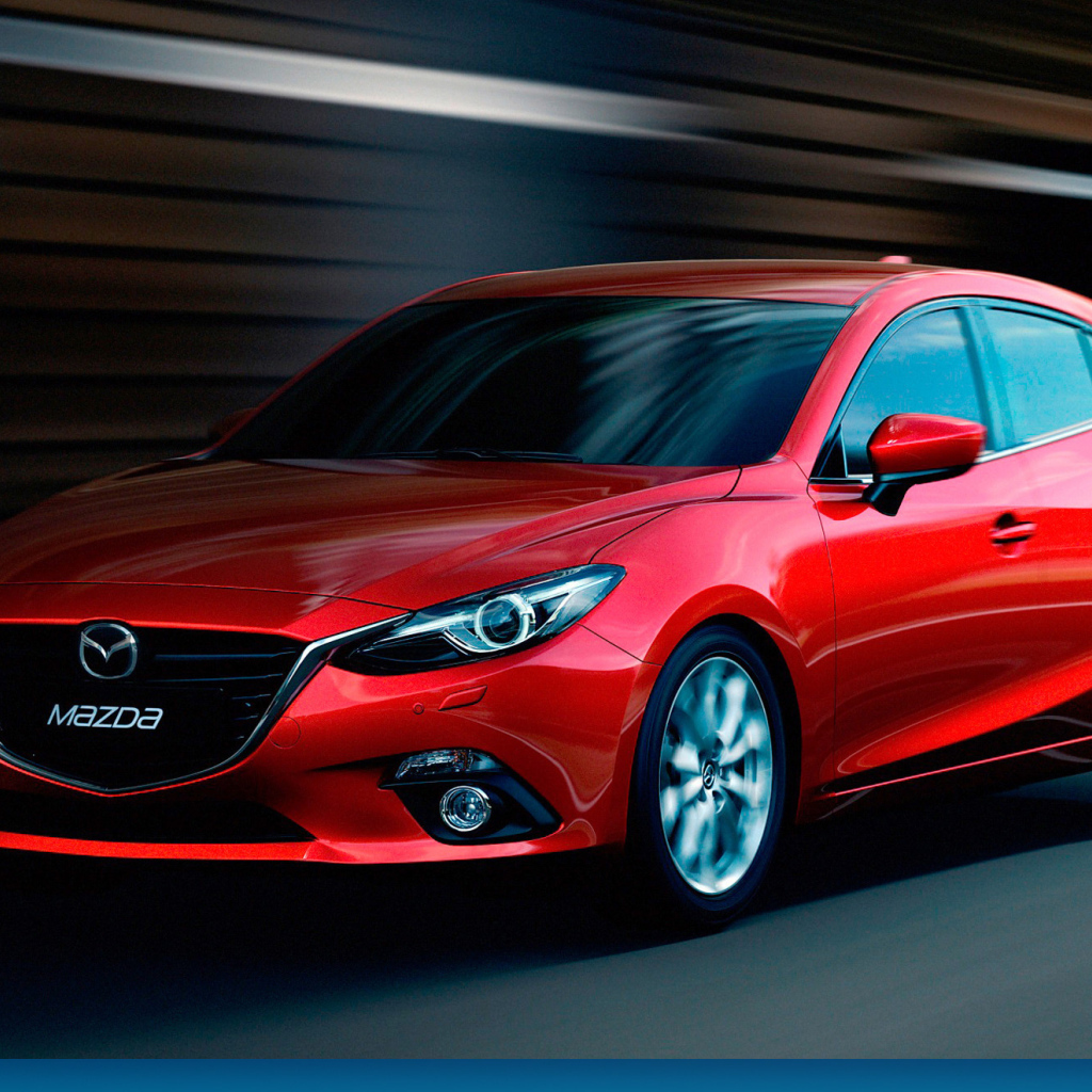 Красивый автомобиль Mazda 3 2014