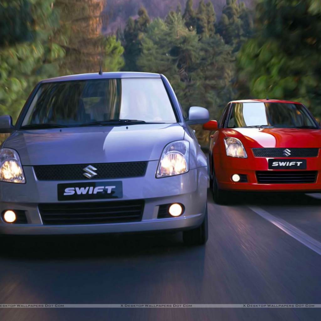 Автомобиль Suzuki Swift на дороге