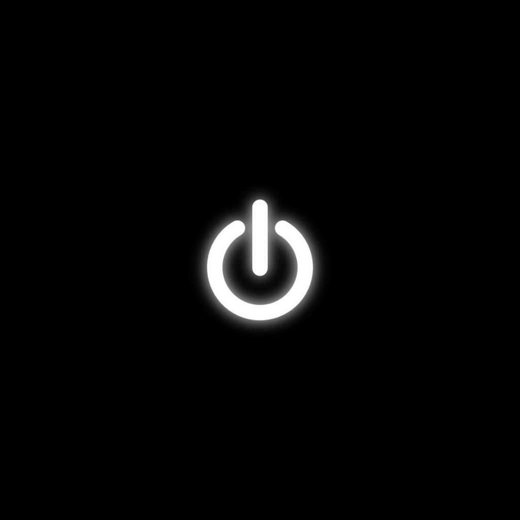 Кнопка питания на черных обоях