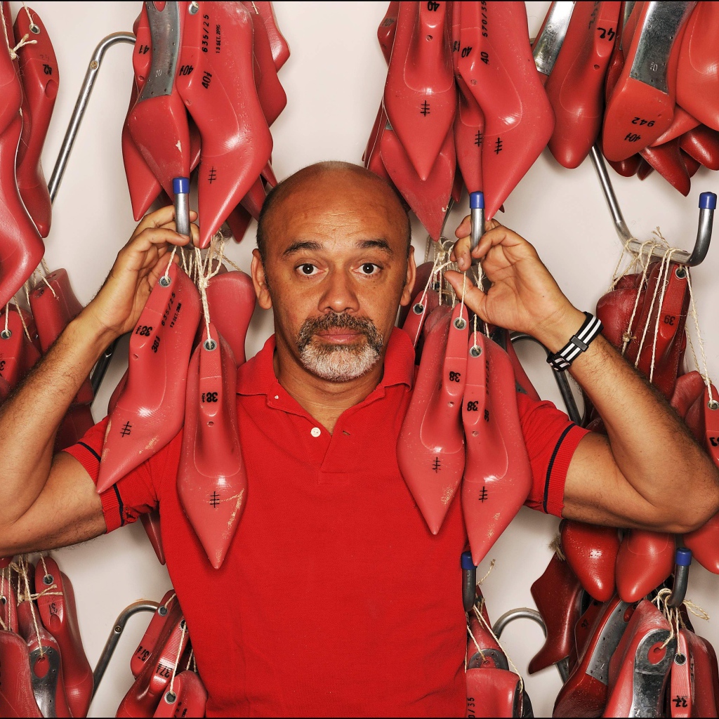 Известный модельер Christian Louboutin