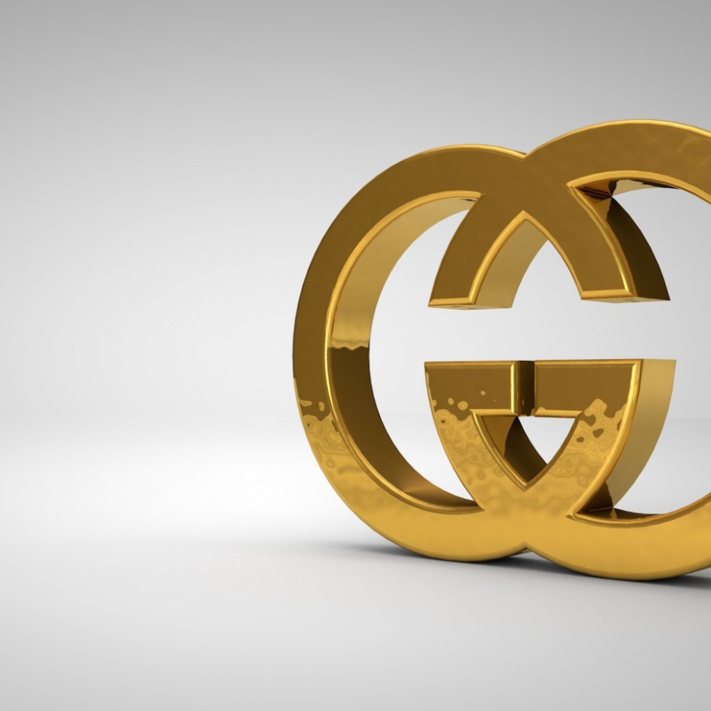 Золотой символ Gucci