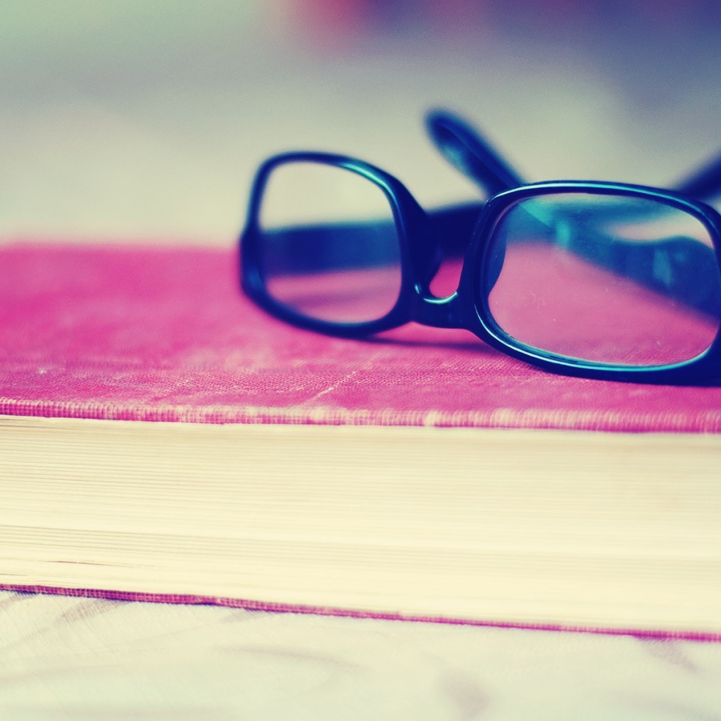 	   Glasses on the pink book