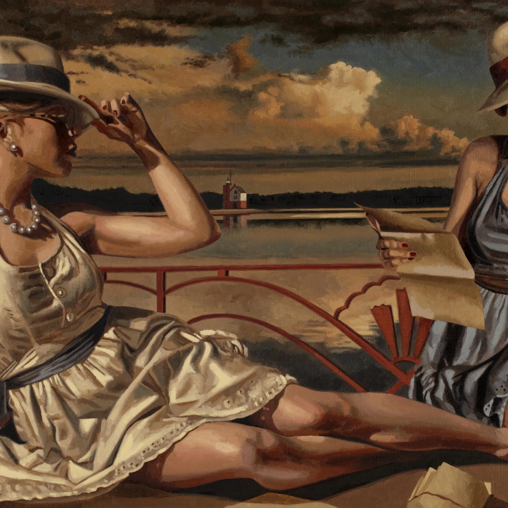 Девушки отдыхают на берегу озера