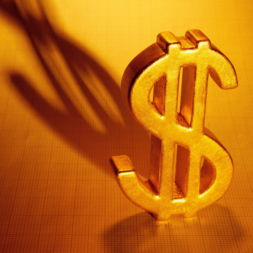 Золотой знак доллара