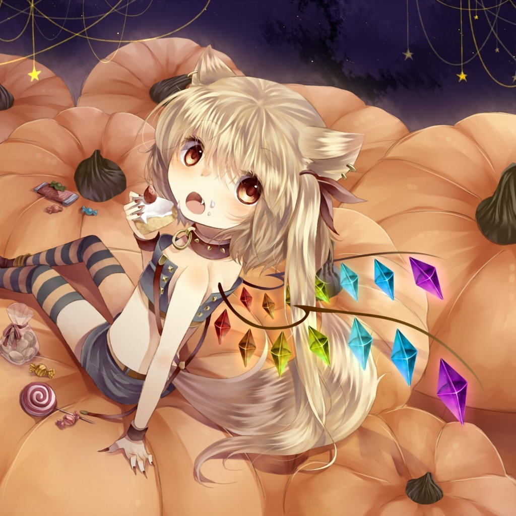 Девочка сидит на тыквах