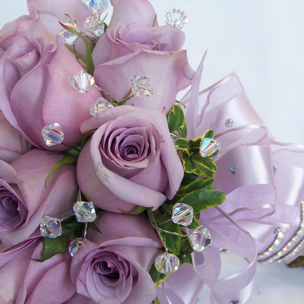 Purple roses in a wedding bouquet