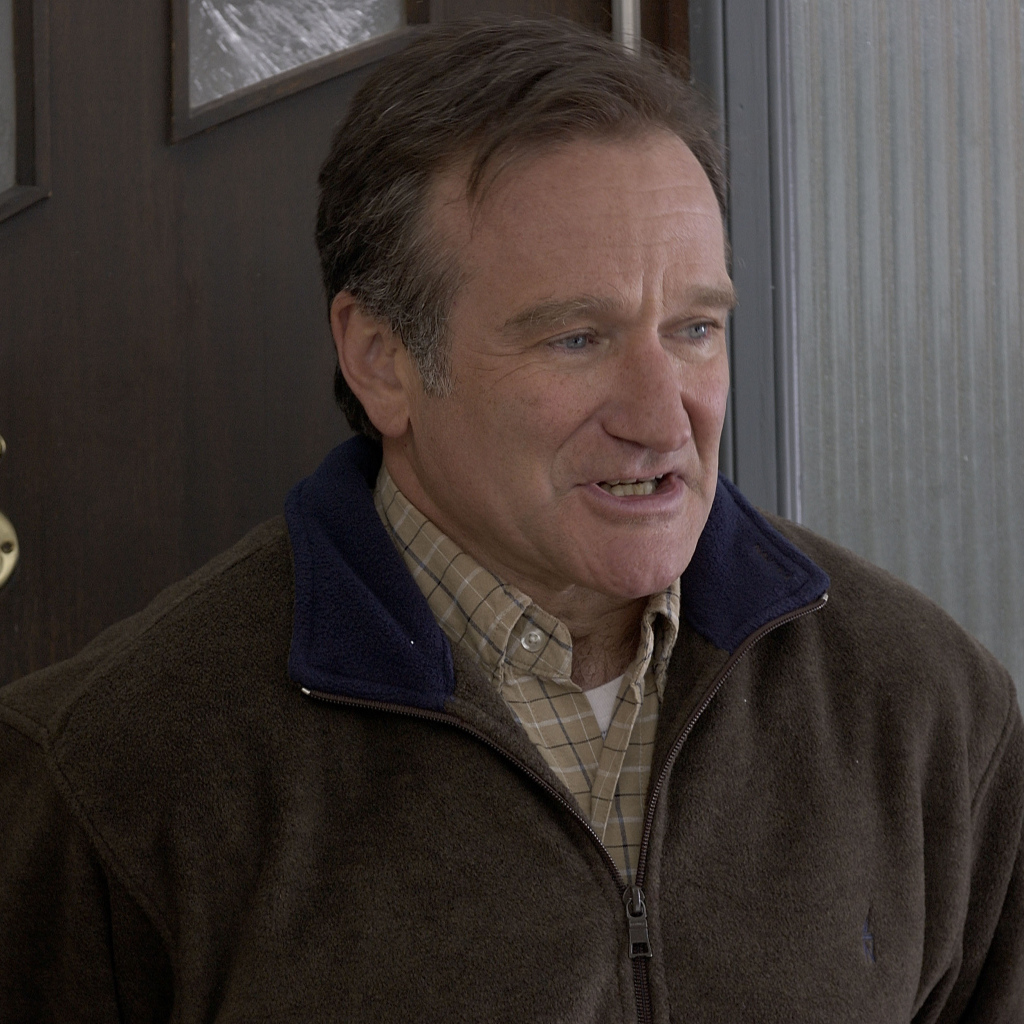 Актер Робин Уильямс у двери