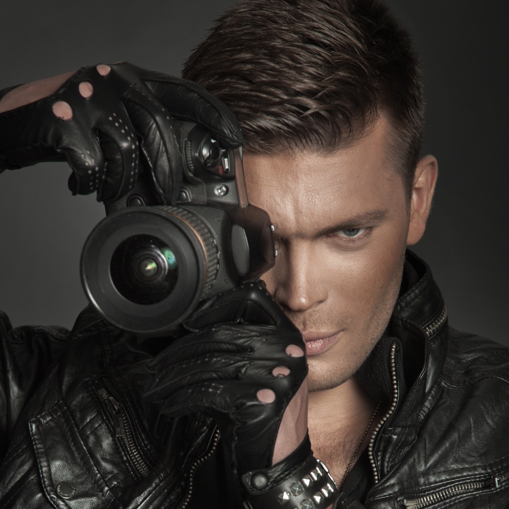 Парень с фотокамерой