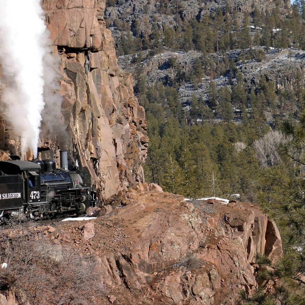 The steam locomotive in the mountains