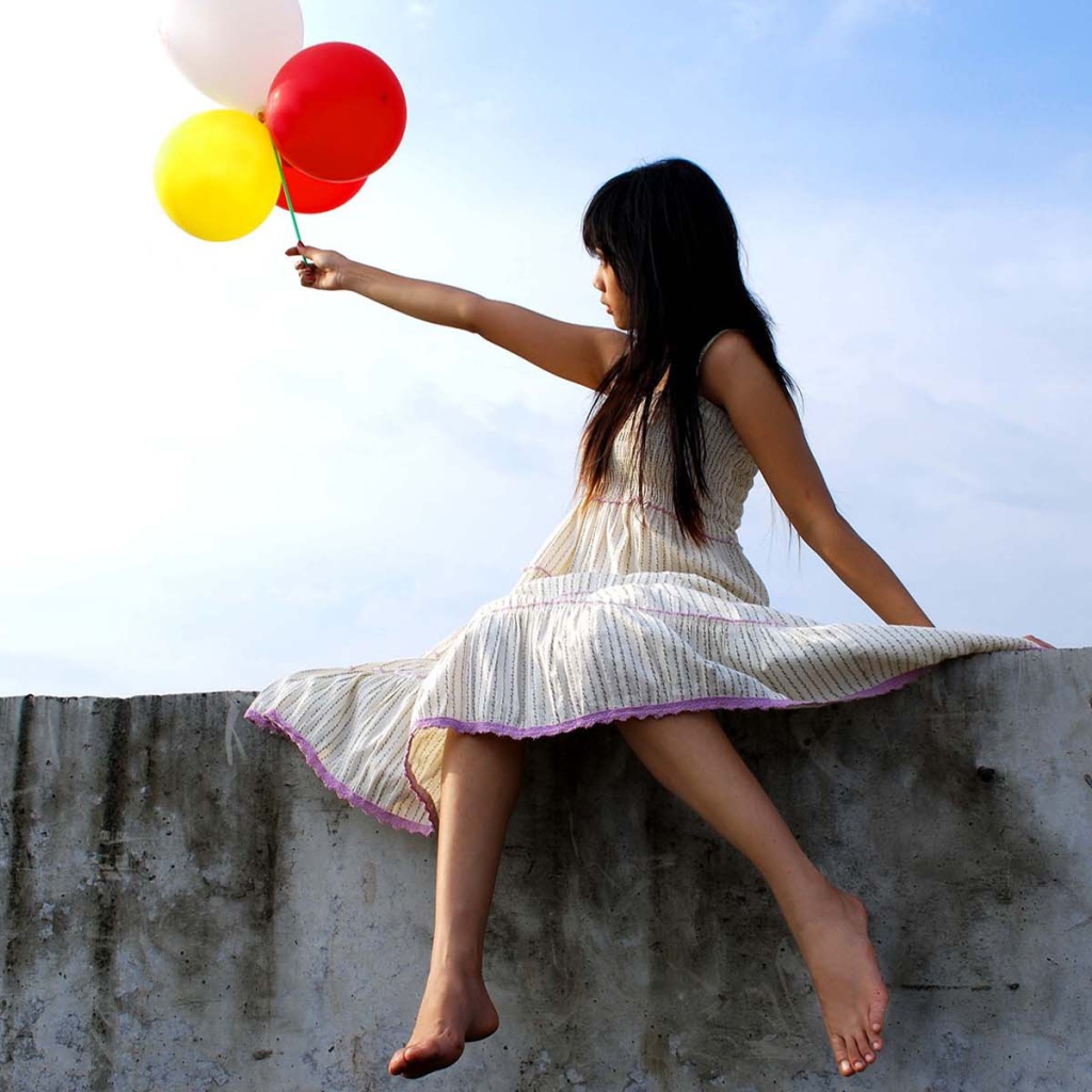 Девочка с воздушными шарами