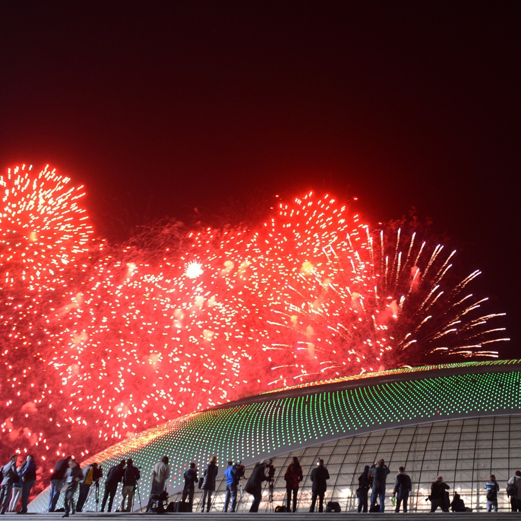 Fireworks over the roof of the stadium at the opening of the Olympic Games in Sochi