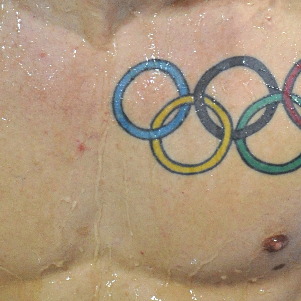 Олимпийские кольца татуировка