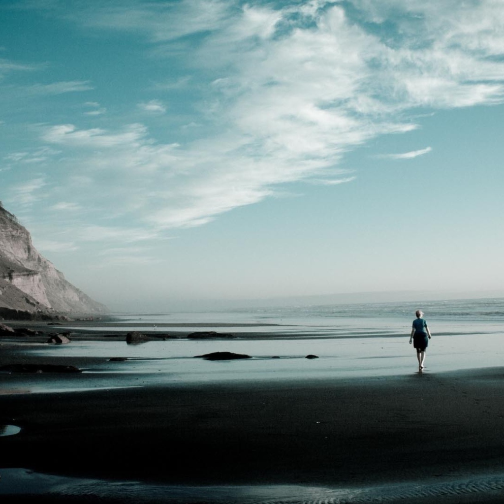 Photo of a woman on the seashore