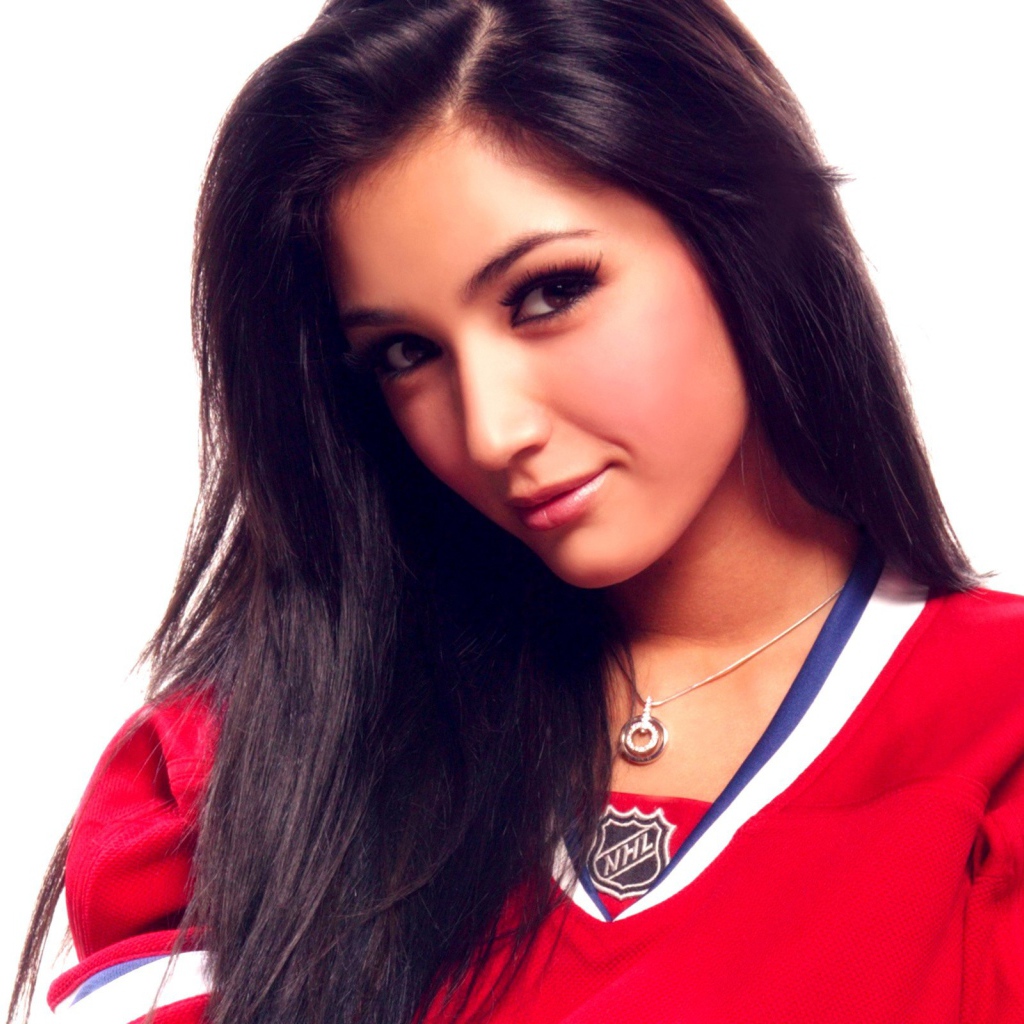 Женщина хоккеист