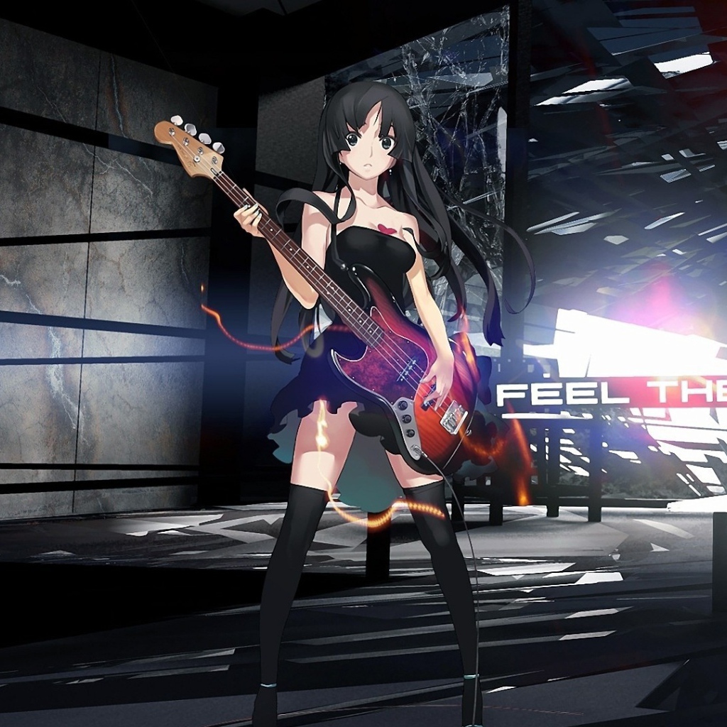 Девушка аниме Akiyama Mio с гитарой