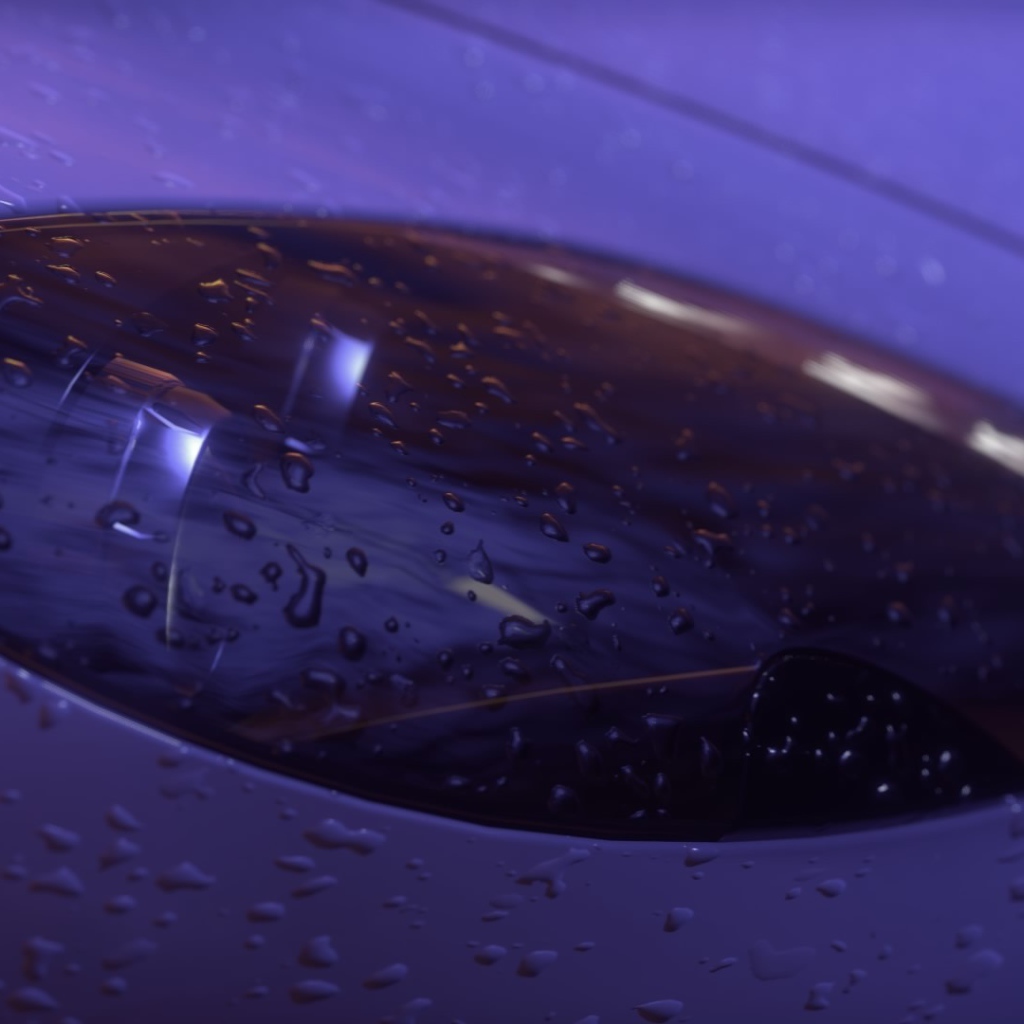 Дождь намочил фару автомобиля