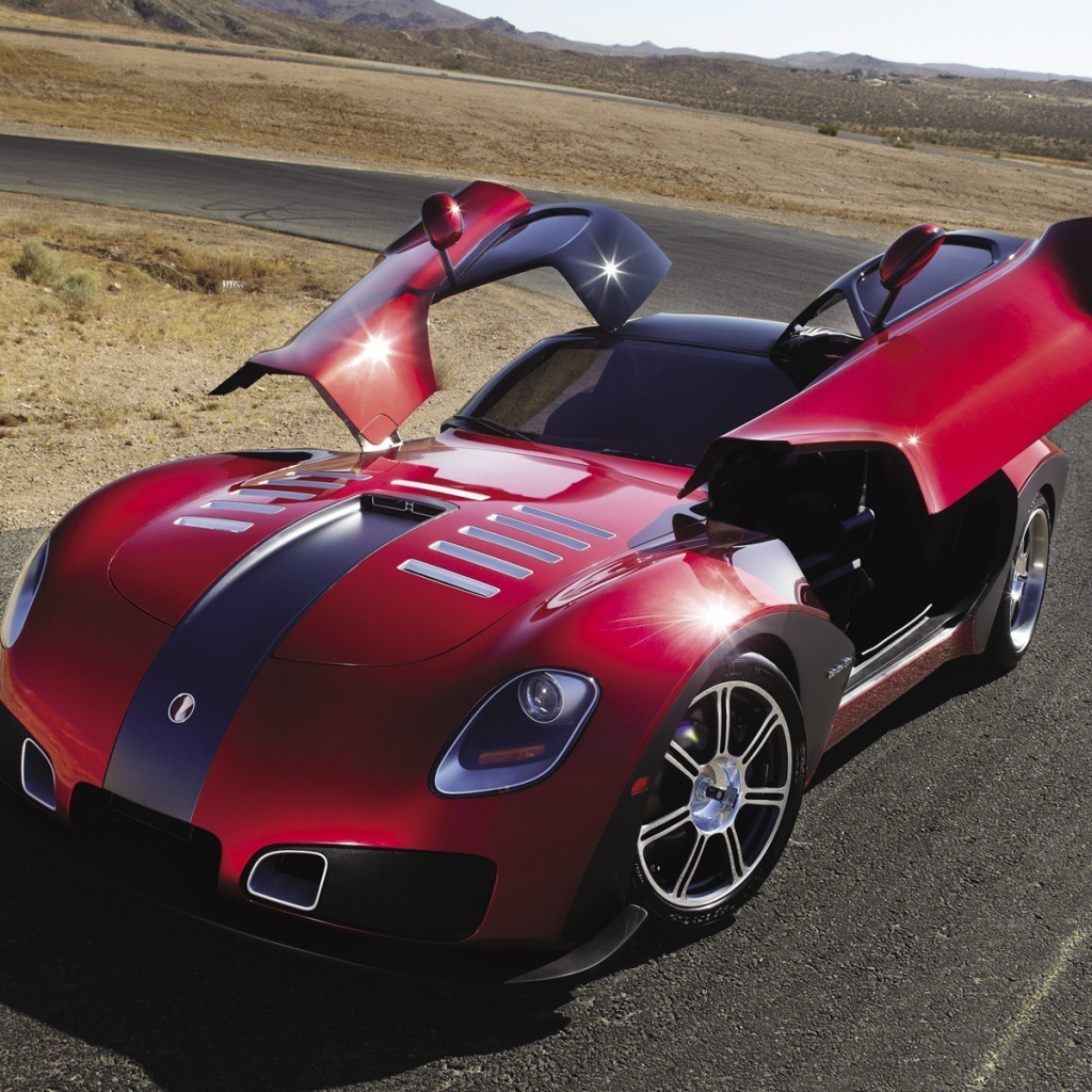 Красный автомобиль Devon GTX на повороте