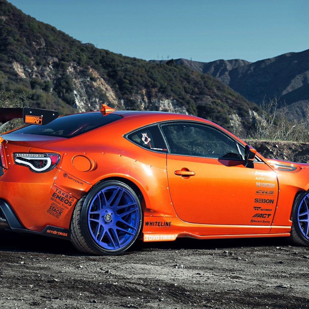 Спортивный оранжевый Scion