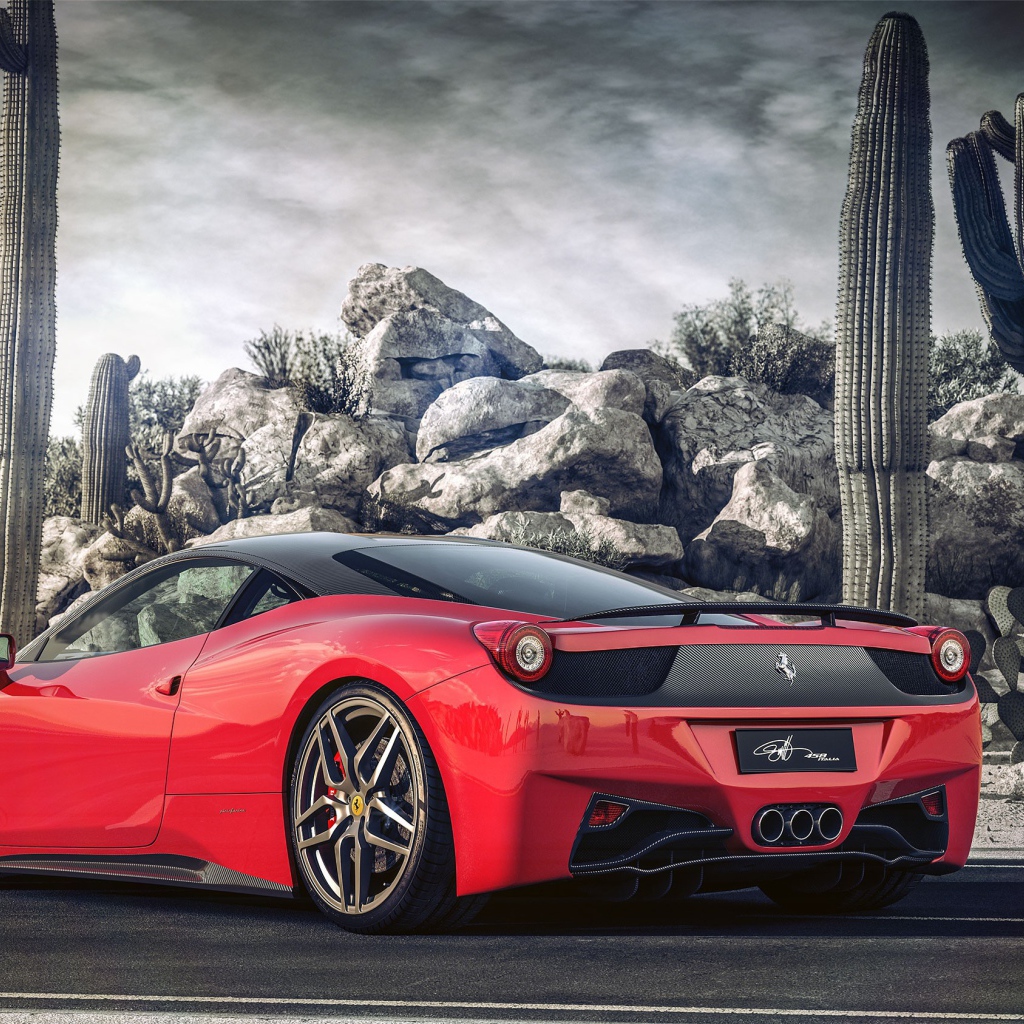 Красный Ferrari у горы из камней