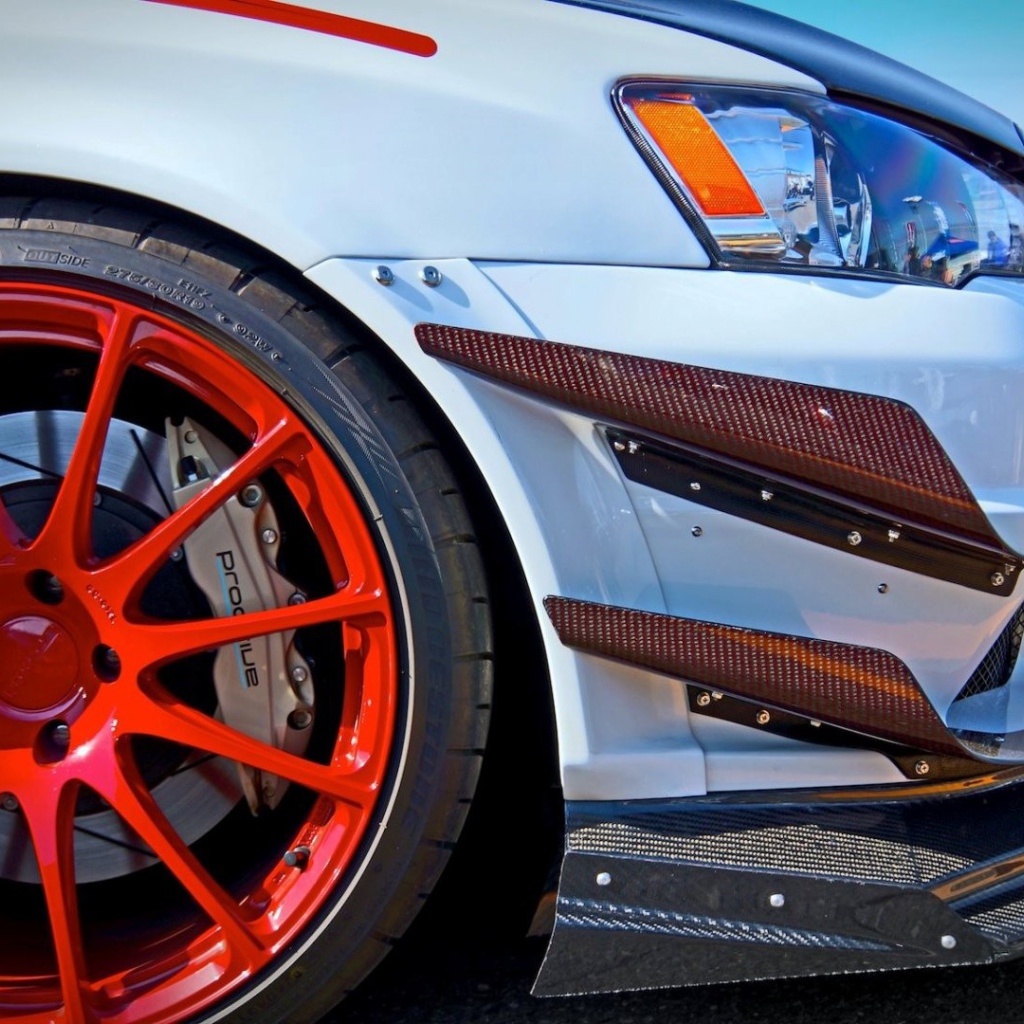 Оранжевый диск автомобиля Mitsubishi Lancer Evo X