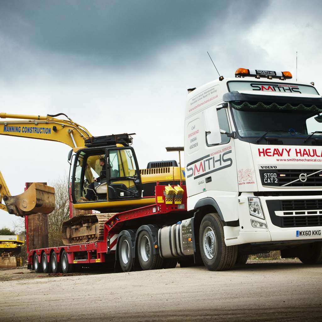 Экскаватор на тягаче