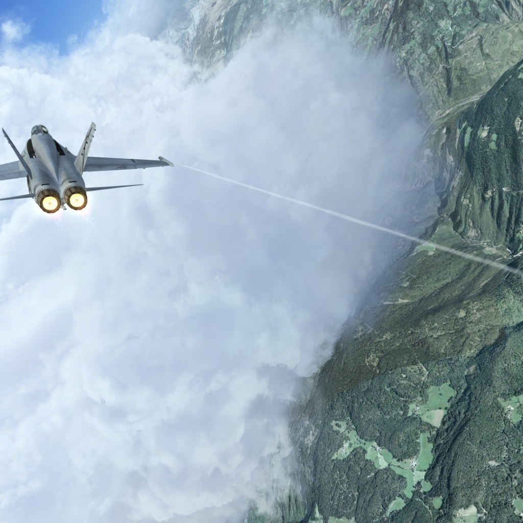 Истребитель летит сквозь облако в горах