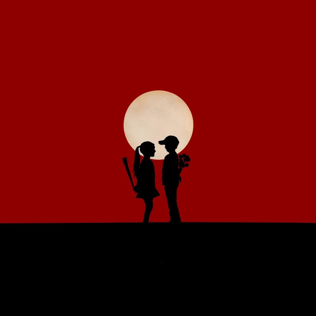 Мальчик и девочка на красном фоне