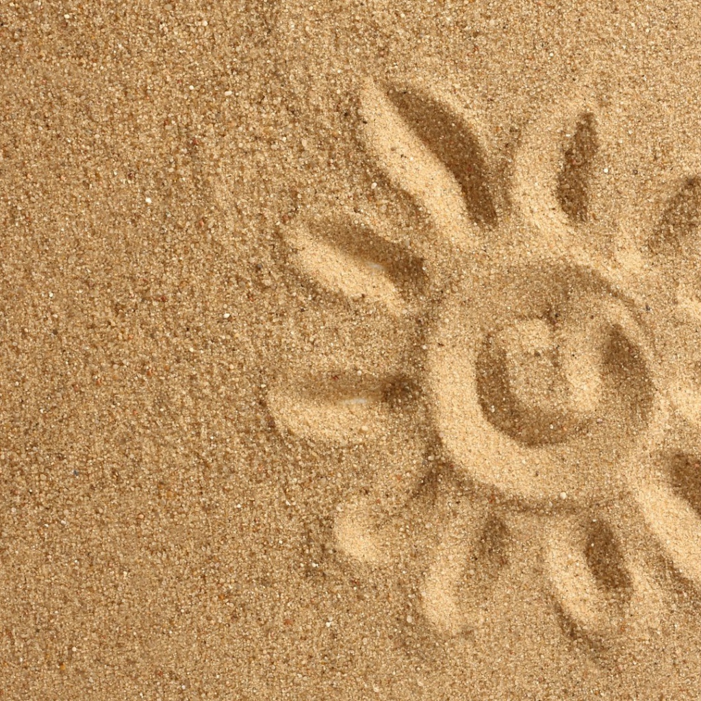 Рисунок солнца на песке