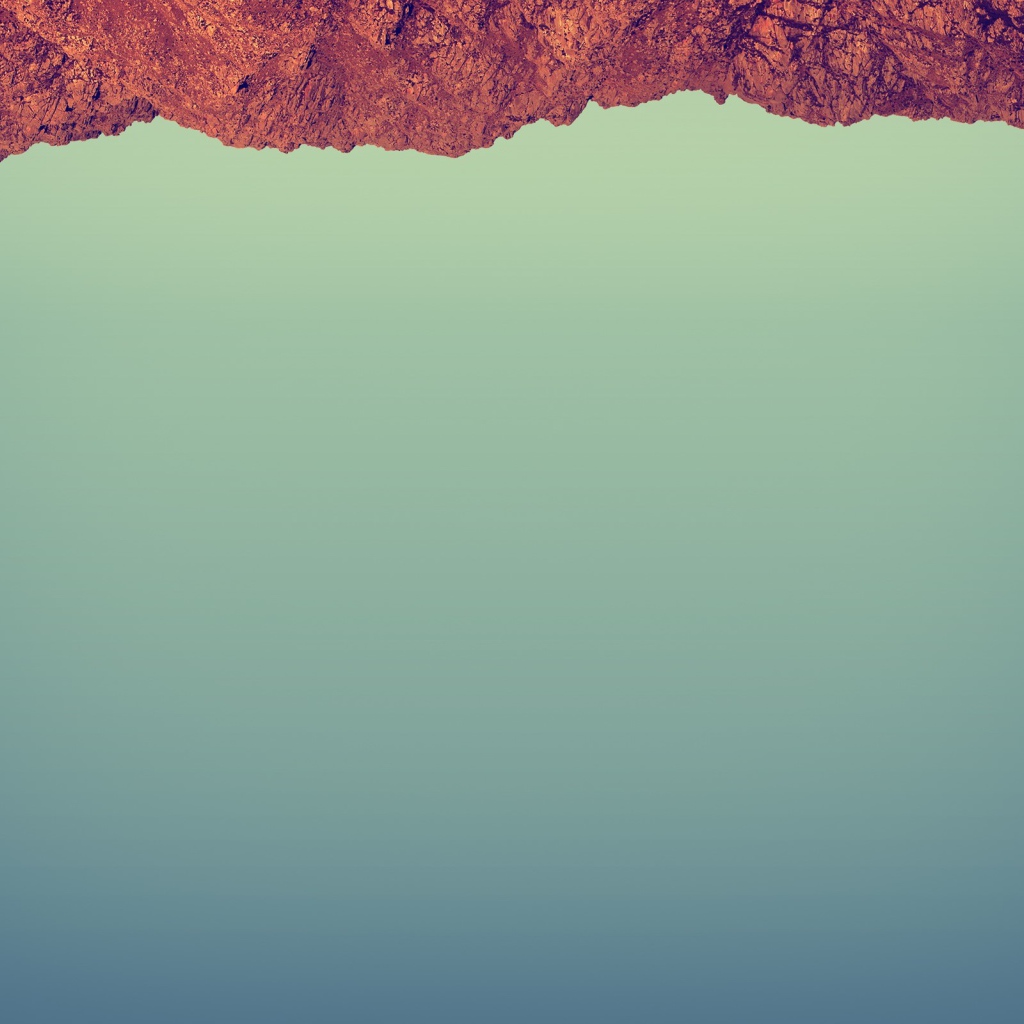 Красный камень на сером фоне