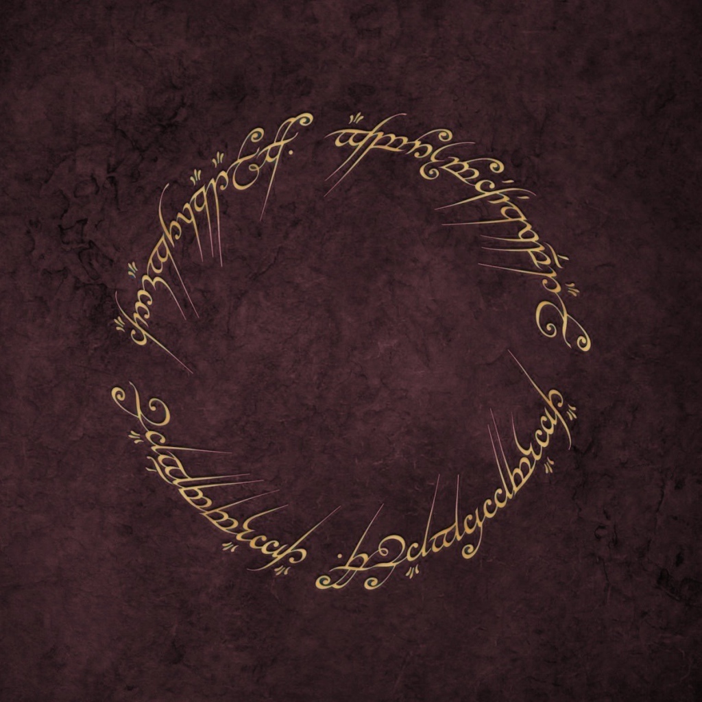 Надписи кольца всевластия на коричневом фоне