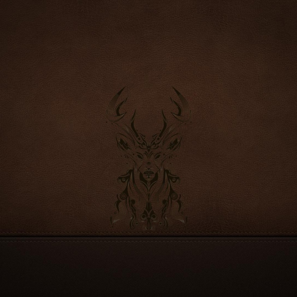 Силуэт оленя на коричневой коже