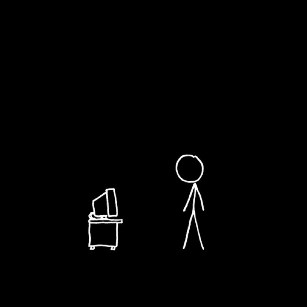 Человек у монитора, черный фон