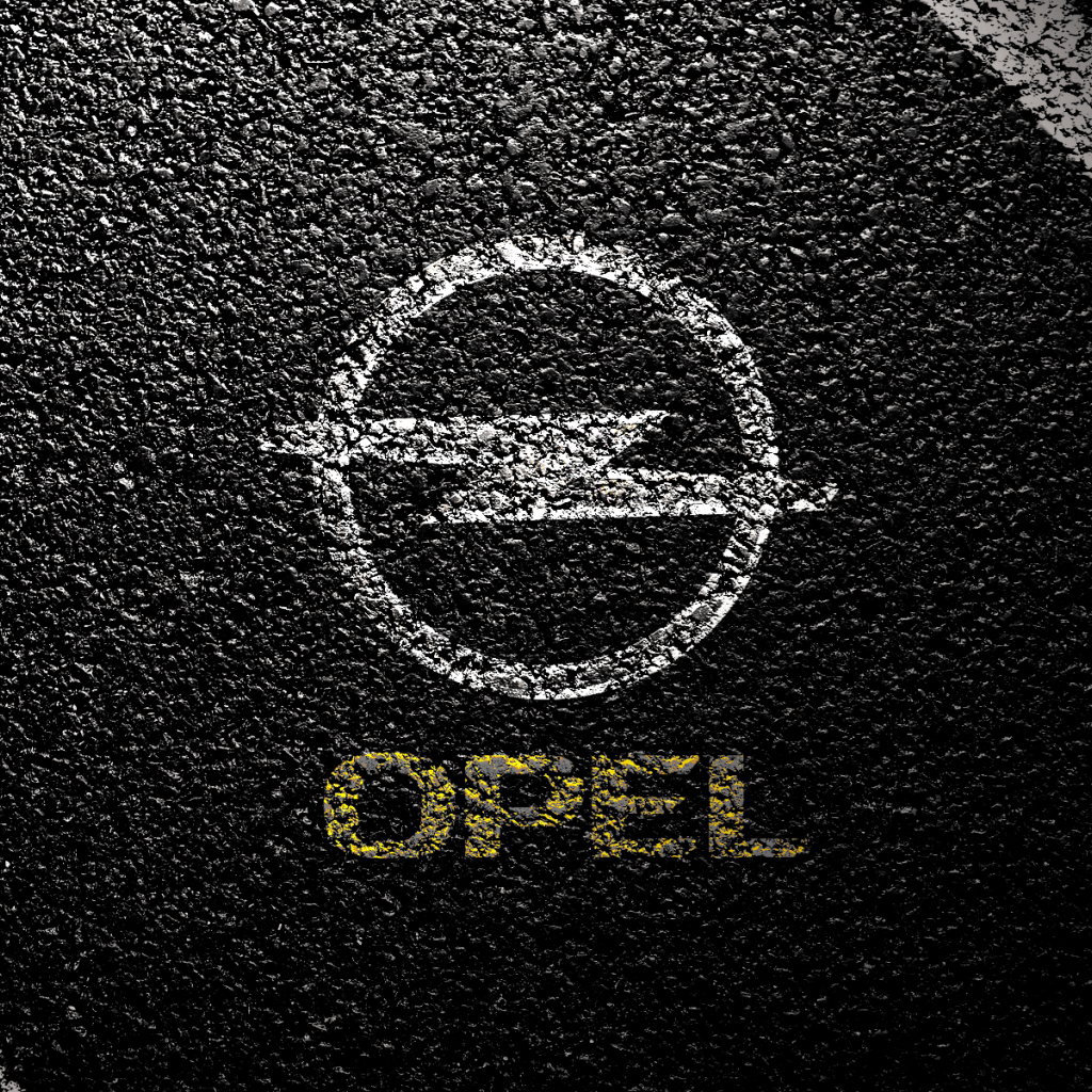 Символ Опель на асфальте