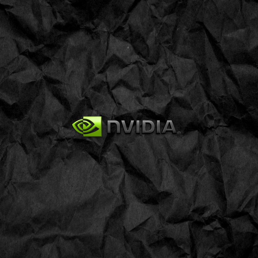 Символика Nvidia на мятой черной бумаге