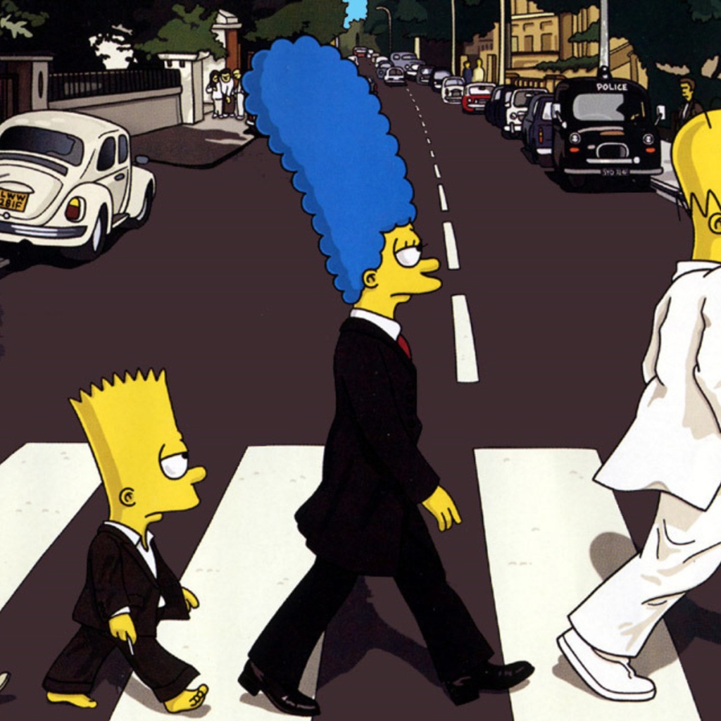 Семья Симпсонов в костюмах переходит дорогу
