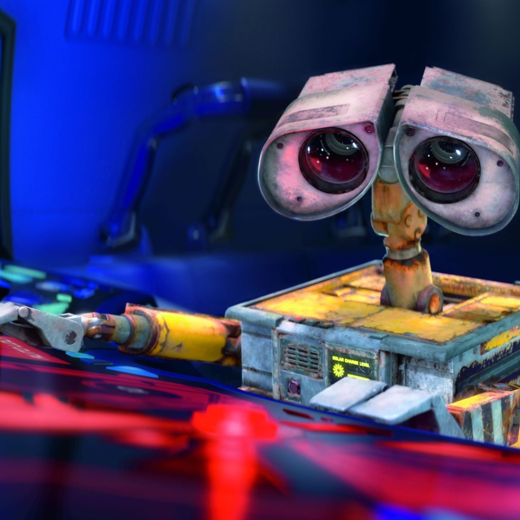 Робот WALL·E за пультом управления